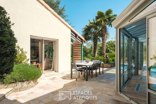 Propriété avec piscine intérieure, étang et parc boisé