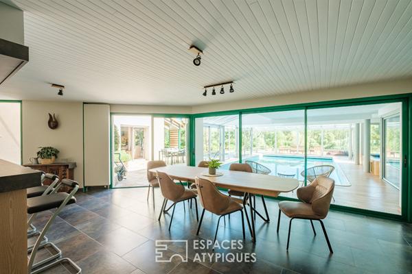 Propriété avec piscine intérieure, étang et parc boisé