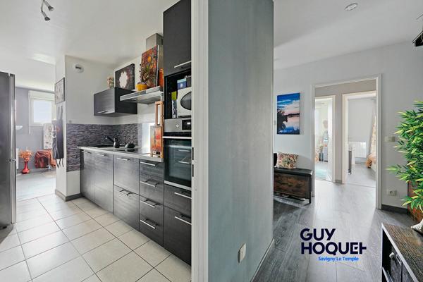 Appartement 3 pièce(s) 73.65 m2 - Terrasse - 2 places de stationnement