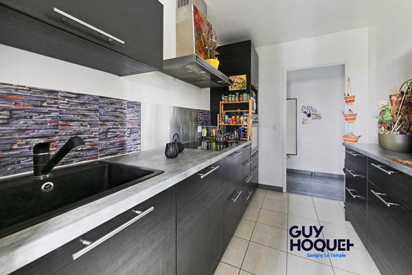 Appartement 3 pièce(s) 73.65 m2 - Terrasse - 2 places de stationnement