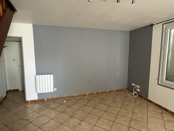Maison avec cour et garage