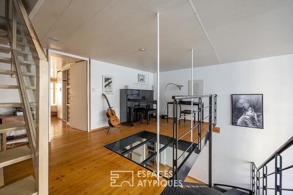 Loft traversant avec patio privé et potentiel locatif à Saint Louis