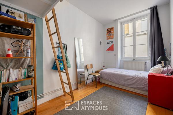 Loft traversant avec patio privé et potentiel locatif à Saint Louis