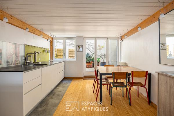 Loft traversant avec patio privé et potentiel locatif à Saint Louis