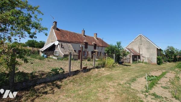 Ancien corps de ferme avec dépendances 