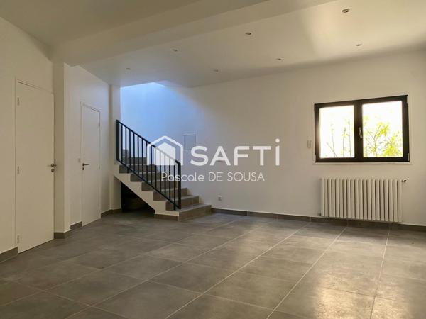 Appartement de 5 pièces avec 3 chambres en duplex inversé avec petit jardin