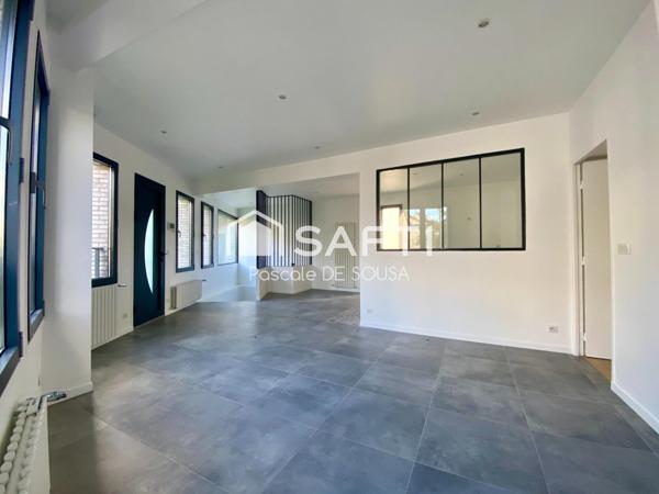 Appartement de 5 pièces avec 3 chambres en duplex inversé avec petit jardin