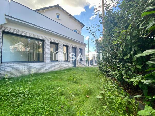 Appartement de 5 pièces avec 3 chambres en duplex inversé avec petit jardin