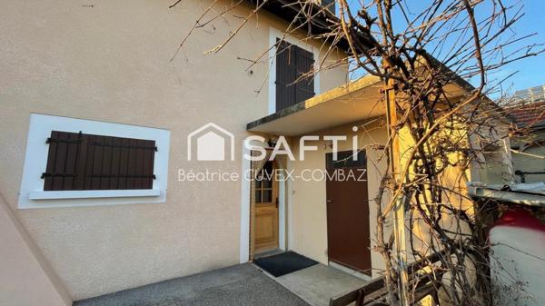 Maison de ville avec jardin et 2 grands garages