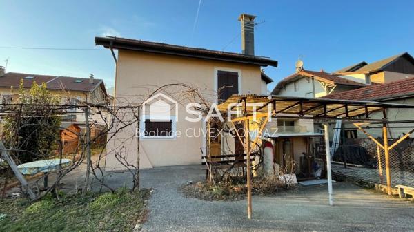 Maison de ville avec jardin et 2 grands garages