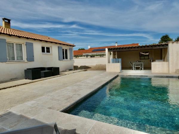 Maison à vendre de 93 m² climatisée a SAINT GILLES (30) avec dépendance et piscine