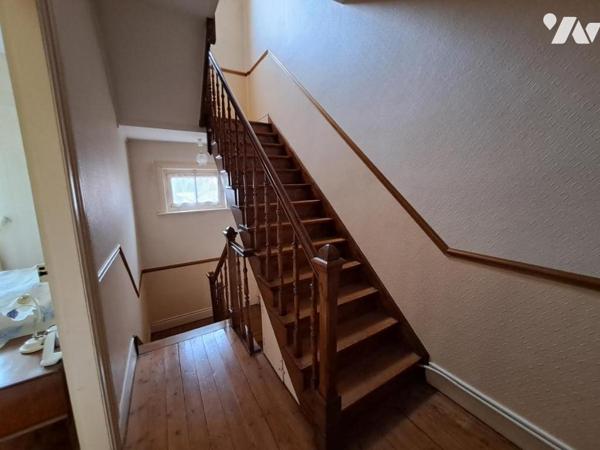 Maison de centre ville avec garage et jardin