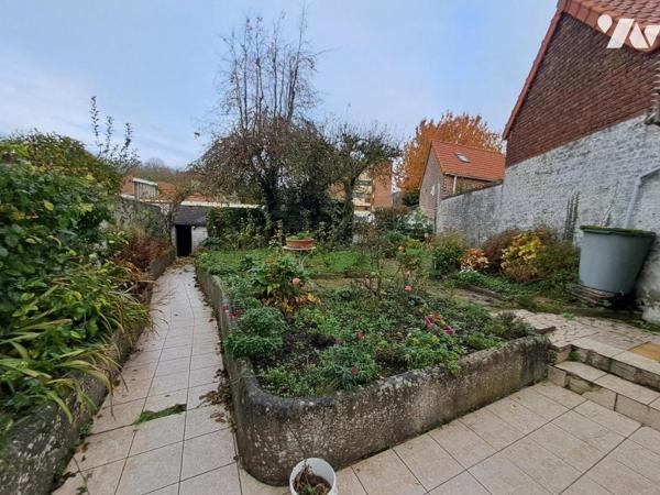 Maison de centre ville avec garage et jardin