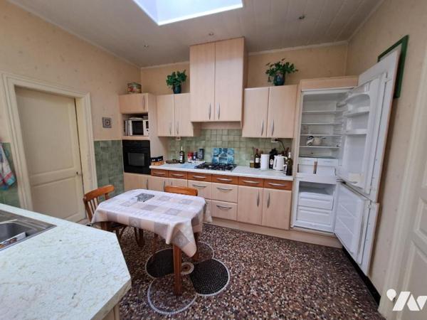 Maison de centre ville avec garage et jardin