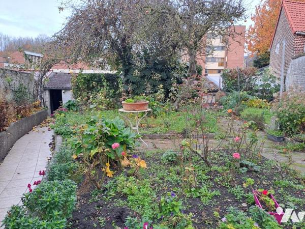 Maison de centre ville avec garage et jardin