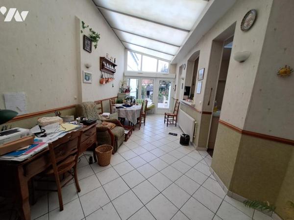 Maison de centre ville avec garage et jardin