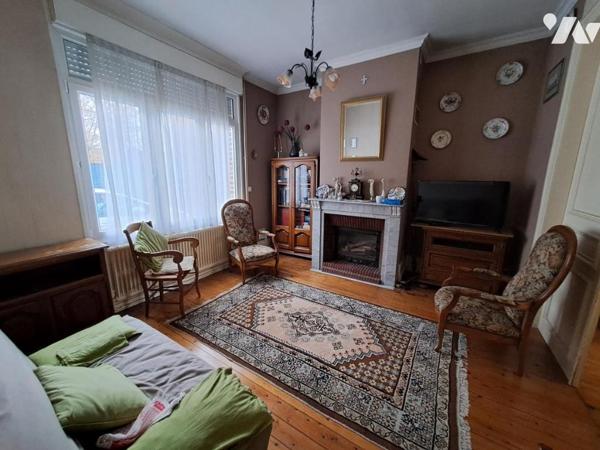 Maison de centre ville avec garage et jardin