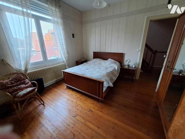 Maison de centre ville avec garage et jardin