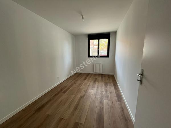 Centre village- Appartement 2 chambres Rez-de-Jardin- Stationnement