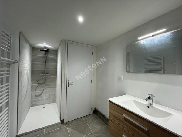 Centre village- Appartement 2 chambres Rez-de-Jardin- Stationnement