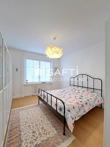 À Riedisheim, appartement rez-de-jardin de caractère, 5 pièces 109 m² et 127 m2 en surface de référence, avec jardin privatif 100 m² – Esprit maison –2 caves.