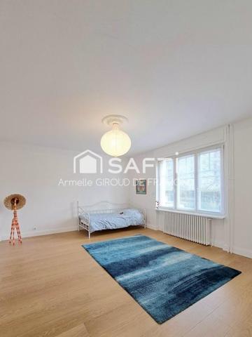 À Riedisheim, appartement rez-de-jardin de caractère, 5 pièces 109 m² et 127 m2 en surface de référence, avec jardin privatif 100 m² – Esprit maison –2 caves.