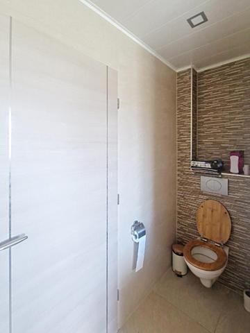 Maison individuelle plain-pied élevée sur sous-sol avec 4 chambres, jardin, garage et terrasse !