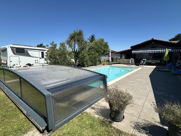 MAISON FAMILIALE SUR 1 800 m² AVEC PISCINE ET LOCAL COMMERCIAL