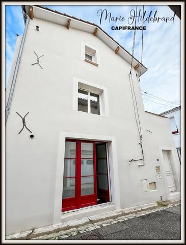 Immeuble de 130m² habitable - 2 appartements - cours