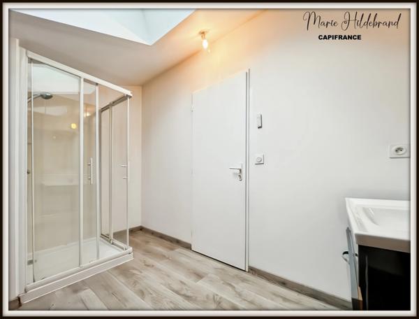 Immeuble de 130m² habitable - 2 appartements - cours