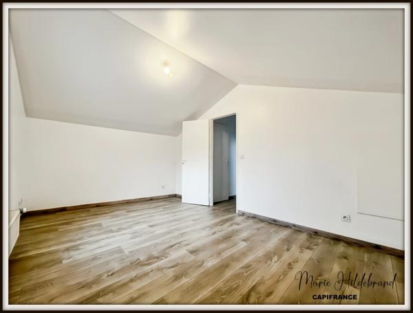Immeuble de 130m² habitable - 2 appartements - cours