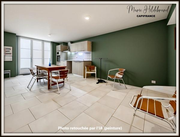 Immeuble de 130m² habitable - 2 appartements - cours