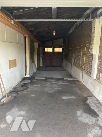 MAISON DE VILLE MITOYENNE D'UN COTE