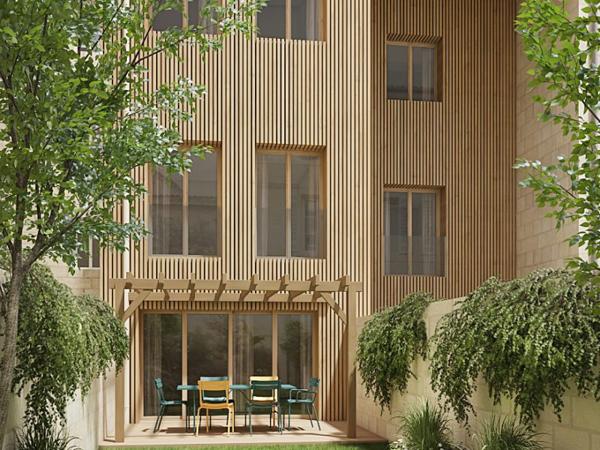 T3 DE PRESTIGE DANS UN IMMEUBLE EN PIERRE