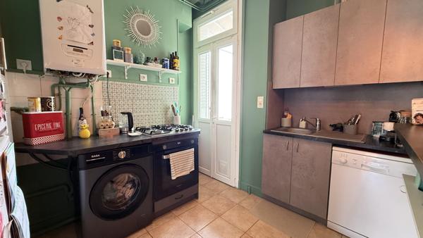 Vichy (03200) Appartement T3 dernier étage avec cave et 2 mansardes proche 4 chemins Vichy
