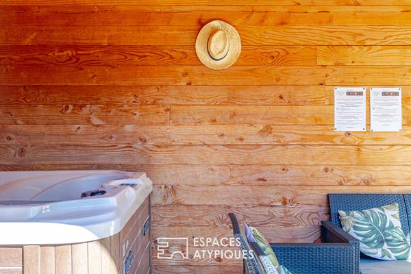 Maison en bois avec jardin arboré et jacuzzi