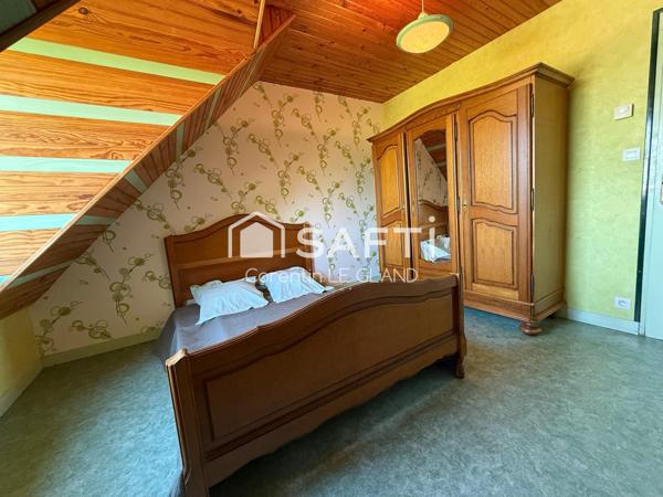 Maison avec sous-sol sur beau terrain arboré