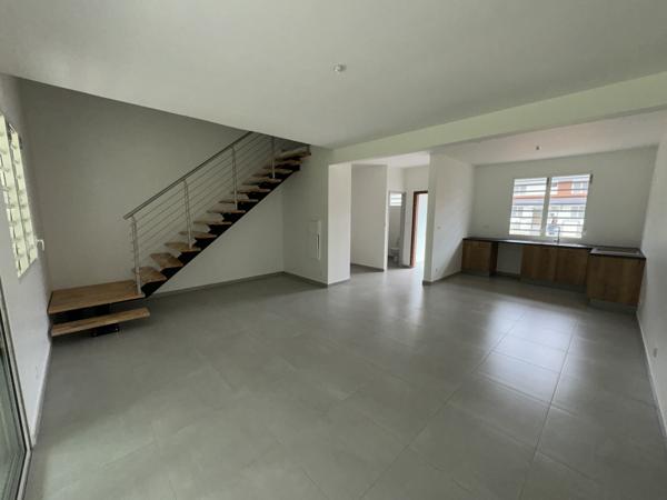 Maison mitoyenne Duplex de type T3 avec jardinet secteur La Chaumière