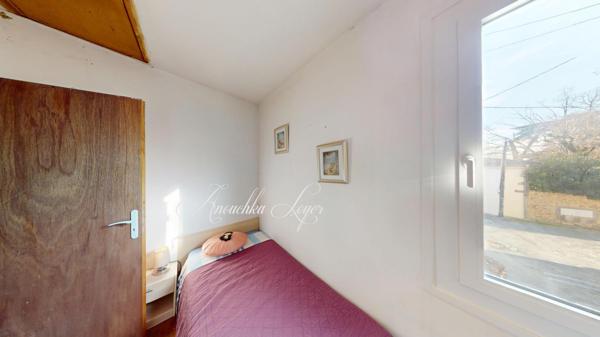 Maison de ville avec garage et jardin