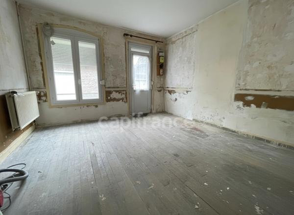 Maison 2 à 3 chambres à rafraîchir.