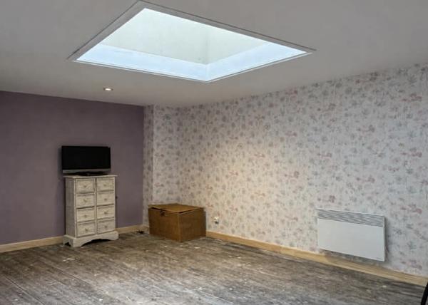 Maison de 3 chambres, et appartement au dernier niveau, salon, cuisine, jardin coeur de ville de Civray