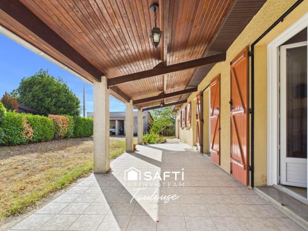 Maison familiale de plain-pied avec 4 chambres, grand garage et  jardin