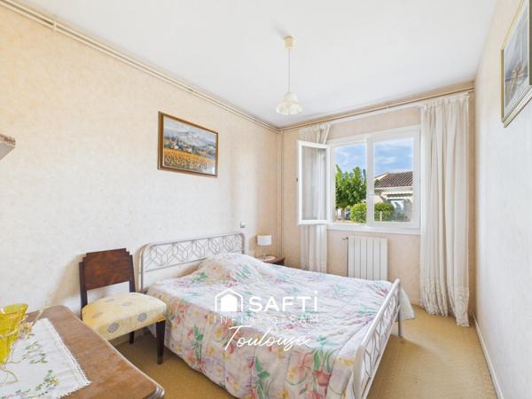 Maison familiale de plain-pied avec 4 chambres, grand garage et  jardin