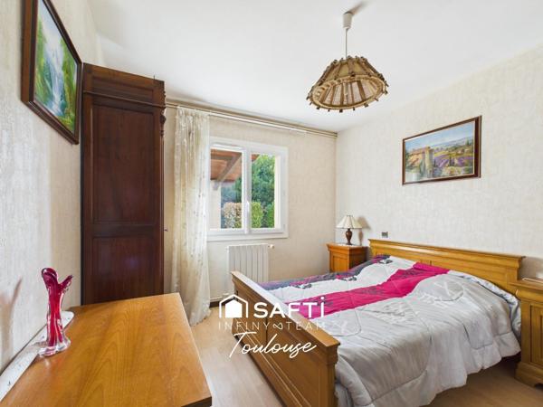 Maison familiale de plain-pied avec 4 chambres, grand garage et  jardin