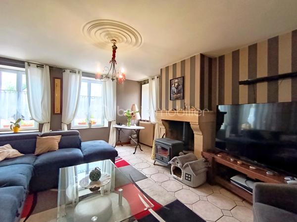 Dans un environnement calme et verdoyant, découvrez cette propriété pleine de charme développant 229 m² environ habitables, composée d'une maison principale de 170 m² environ et d'un gîte indépendant de 59 m² environ, sur un magnifique terrain arboré de 2 335 m².

La maison principale ( 170 m²)
Cette belle maison de caractère allie authenticité, confort et excellentes performances énergétiques.

Rez-de-chaussée:
Entrée ;
Grande cuisine aménagée et équipée avec espace repas ;
Salle à manger ;
Salon chaleureux avec poêle à bois et espace bar ;
Chambre ;
WC indépendant.

Premier étage:
Suite parentale ;
Chambre avec placard ;
Bureau avec toilette
Salle de bains.

Deuxième étage
Chambre ;
Pièce annexe actuellement utilisée en dressing.

Le gîte indépendant (59 m²)
Parfait pour accueillir famille et amis ou développer une activité de location touristique.

Il comprend :
Séjour - salle à manger ;
Cuisine ;
WC indépendant.
Etage
Chambre ;
Salle de bains ;

Les extérieurs
Implantée sur un superbe terrain arboré de 2 335 m², la propriété bénéficie d'un cadre privilégié.
Vous profiterez notamment :
D'une terrasse attenante à la maison ;
D'une seconde terrasse de 40 m² ;
D'une dépendance d'environ 30 m² ;
D'un puits équipé d'un système de pompe ;
De nombreux espaces verts propices à la détente.
Prestations et confort

Maison principale
Classe énergétique A, un atout extrêmement rare pour une maison de caractère ;
Pompe à chaleur ;
Ballon thermodynamique ;
Double vitrage ;
Tout-à-l'égout ;
Poêle à bois.

Gîte
Classe énergétique E.

Les atouts
✔ Excellent DPE : Maison classée A
✔ Gîte indépendant de 59 m²
✔ Terrain arboré de 2 335 m²
✔ Deux terrasses dont une de 40 m²
✔ Dépendance de 30 m²
✔ Puits avec pompe
✔ Chambre au rez-de-chaussée
✔ Idéal projet familial, touristique ou activité de gîte
Une propriété de caractère offrant un cadre de vie exceptionnel, des prestations énergétiques remarquables et un fort potentiel d'exploitation grâce à son gîte indépendant.

A VISITER RAPIDEMENT!