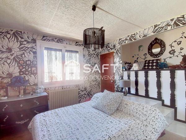 Maison de 125 m² sur un joli terrain avec piscine et terrasses - 3 chambres - Garage