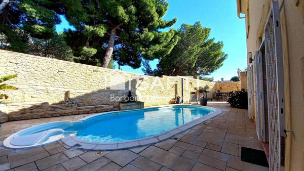 Maison de 125 m² sur un joli terrain avec piscine et terrasses - 3 chambres - Garage