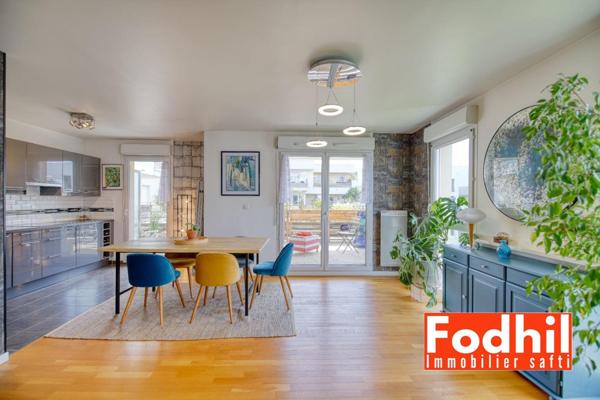 Écoquartier- Appartement 5 pièces- 3 ch avec terrasse, 2 parkings et une cave.