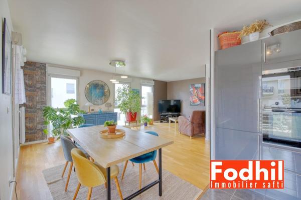 Écoquartier- Appartement 5 pièces- 3 ch avec terrasse, 2 parkings et une cave.