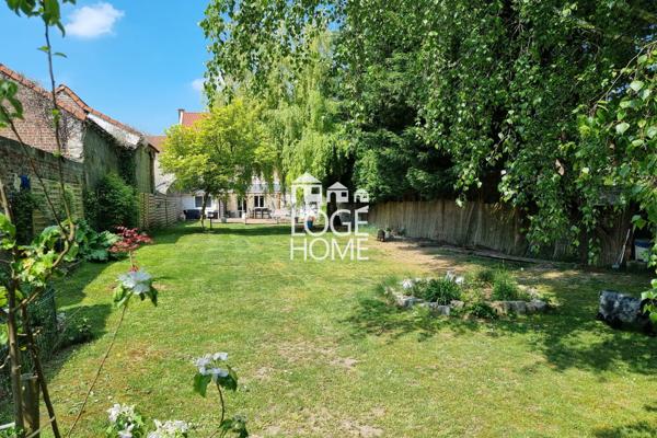 Maison de ville – 170 m² – 5 chambres – jardin sans vis-à-vis – garage traversant + cave à vendre